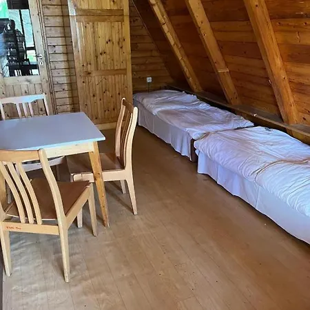 Sloneczna Osada Деревянный коттедж *